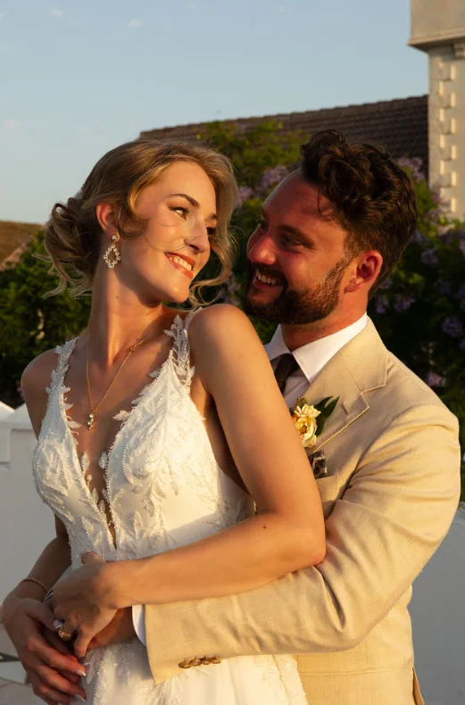 The couple at golden hour at Fort Inglés, in Mijas, with the bride's updo still intact