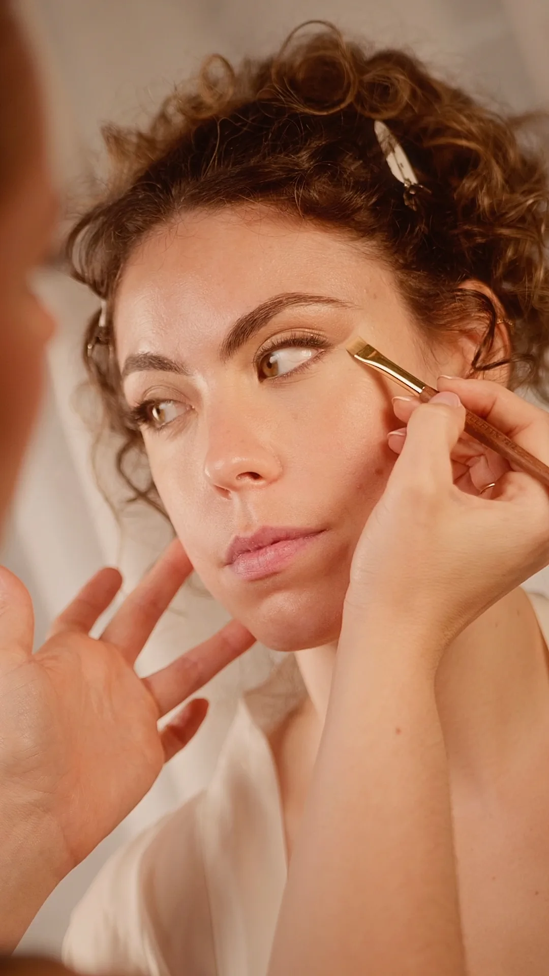 Brush on the eye in a wedding makeup